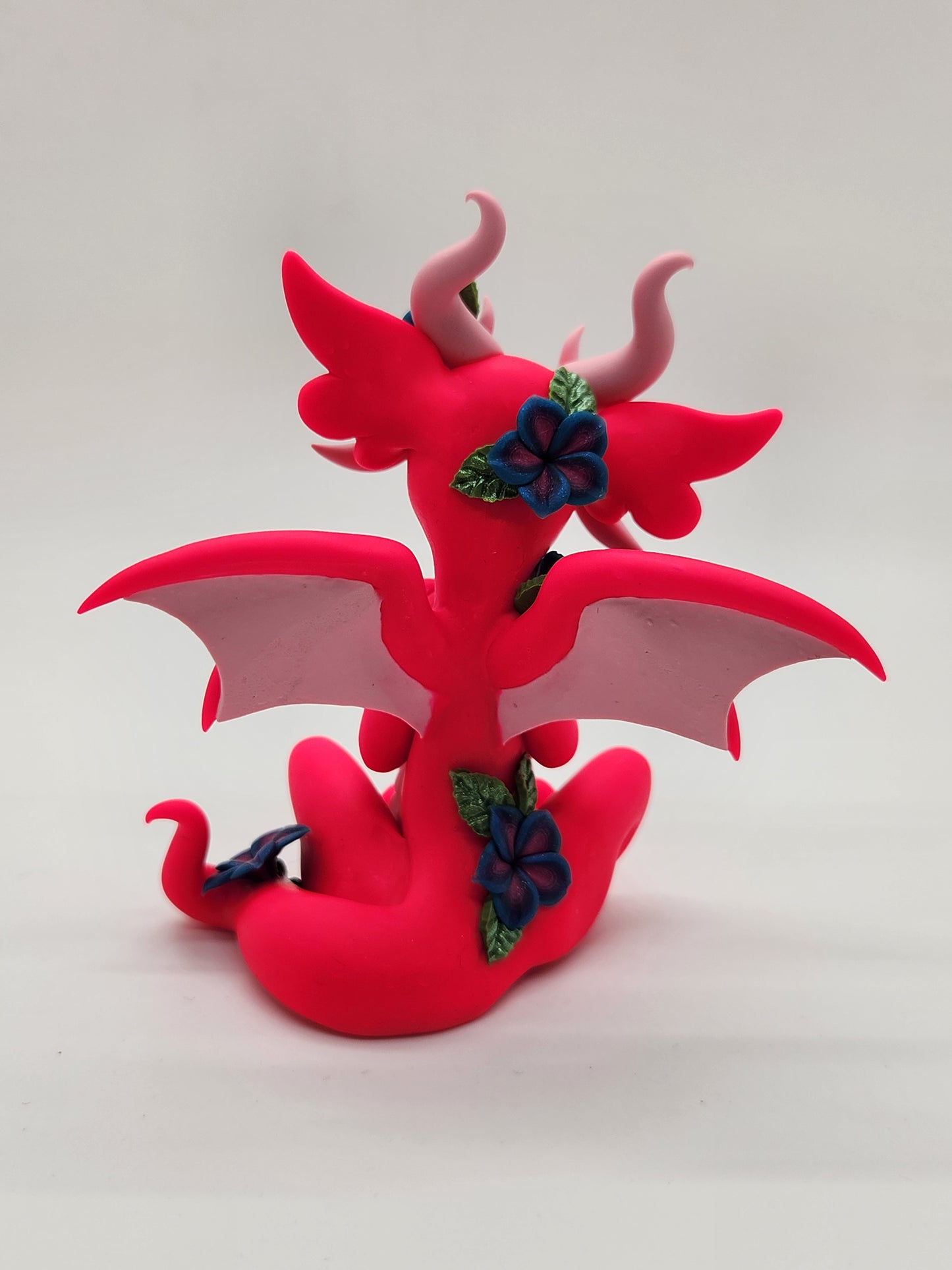 "Dianthus" pink flower dragon sculpture