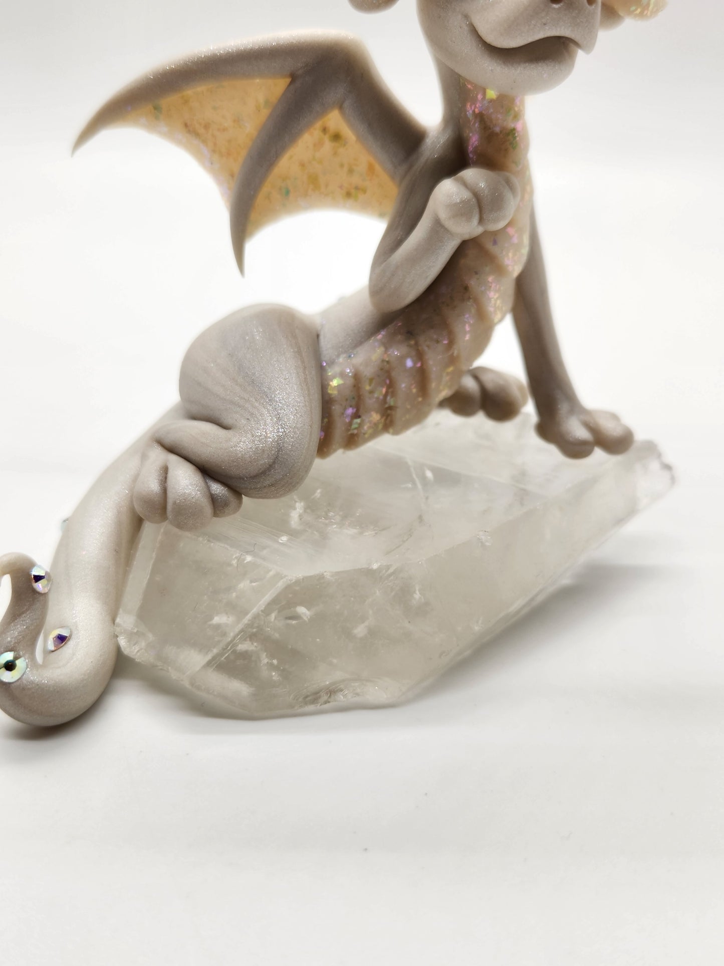 "Rein" white dragon sculpture with clear quartz chunk