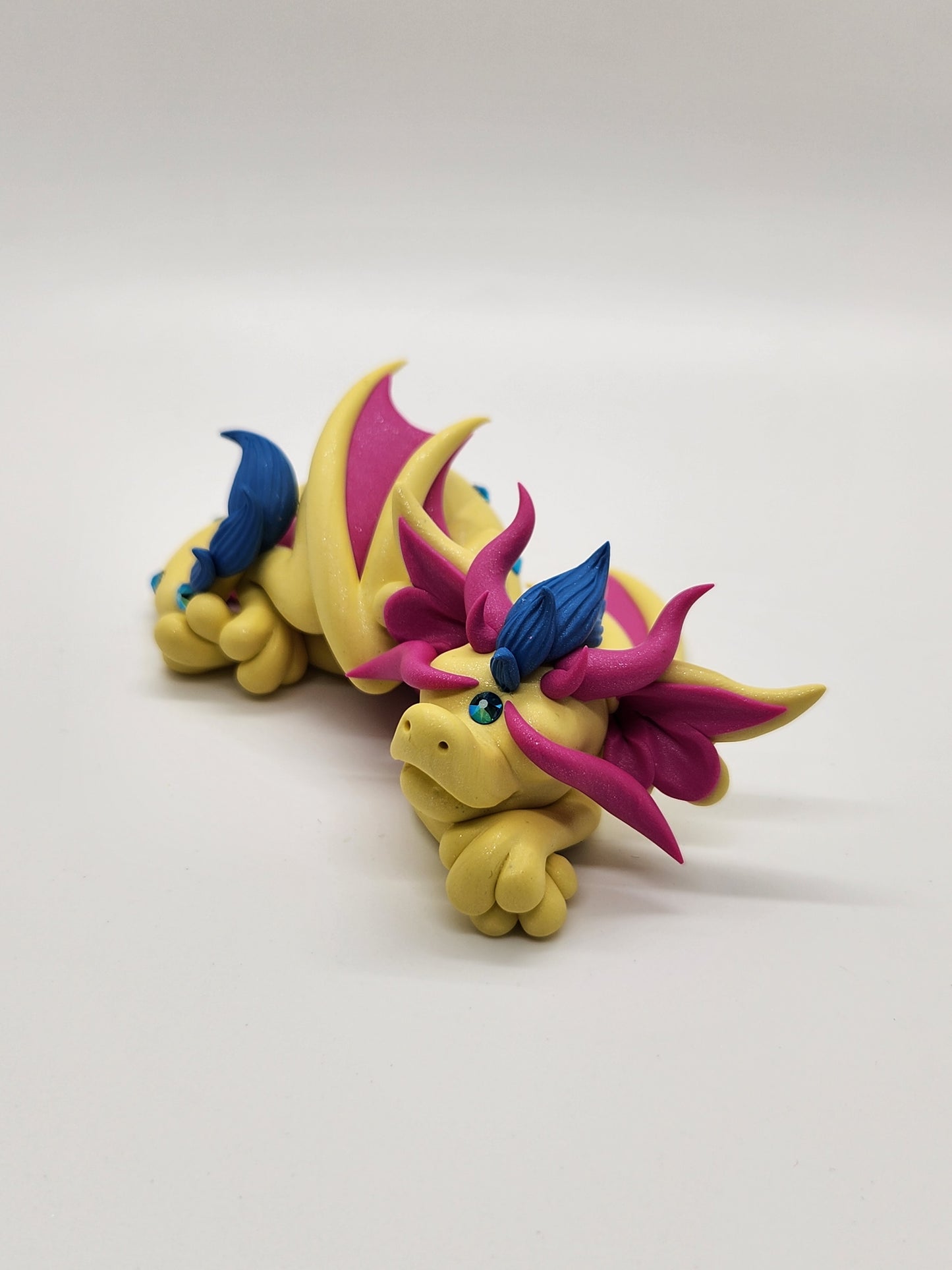 "Devin" yellow and pink pan pride dragon sculpture