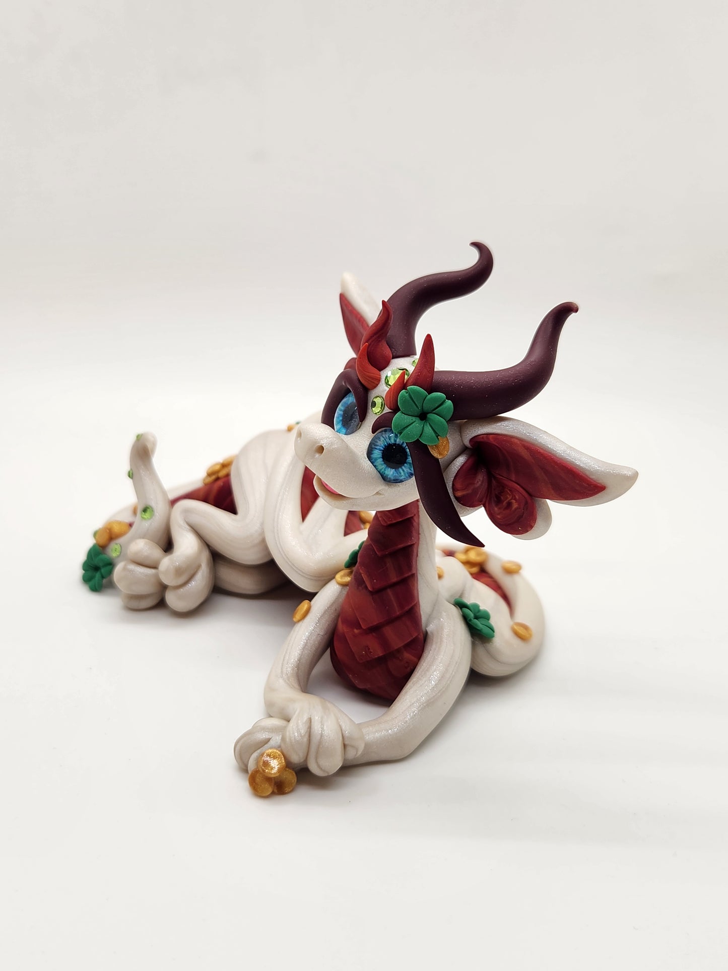 "Ádh" white and red dragon sculpture