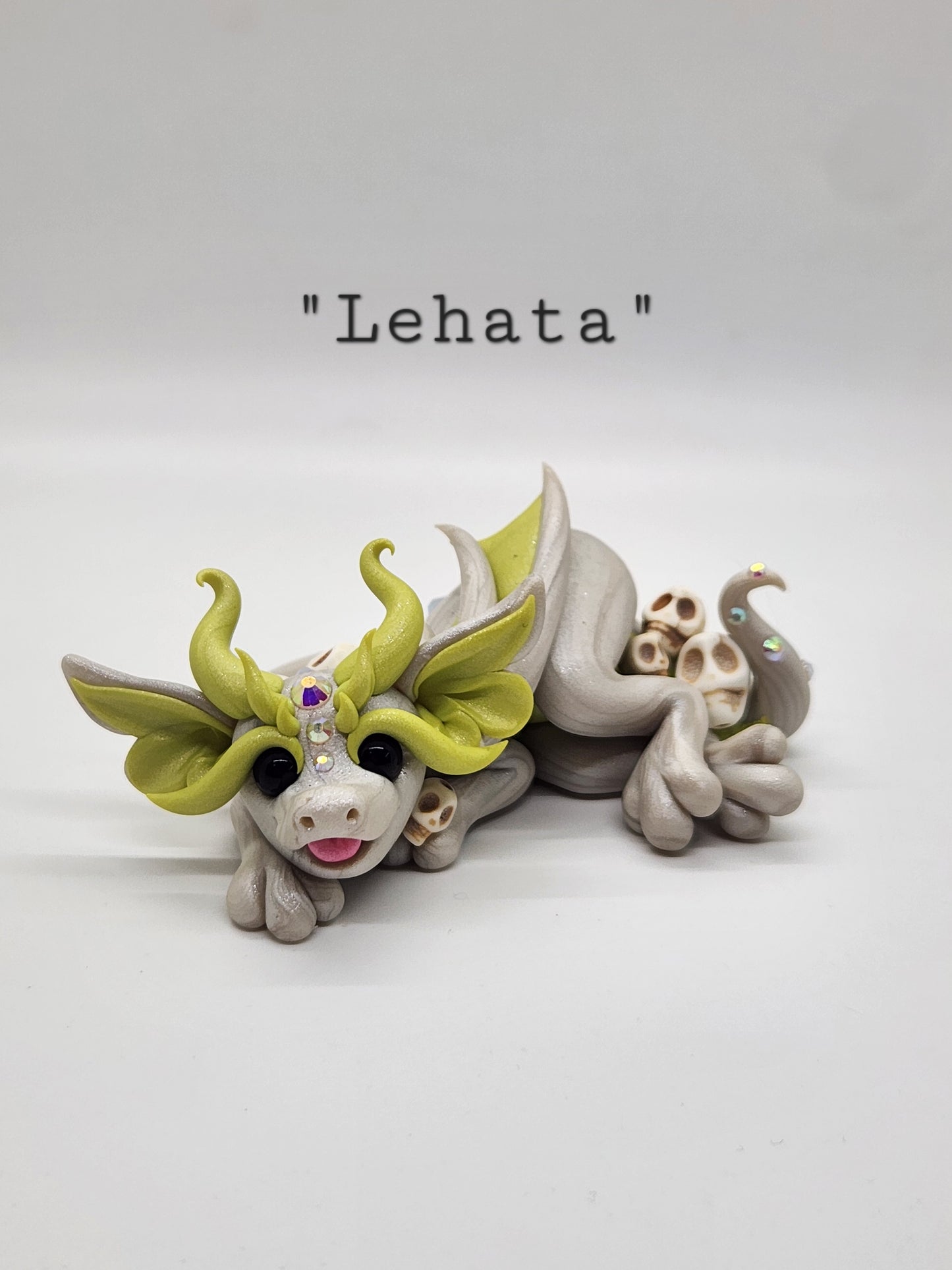 "Lehata" white and green skull dragon sculpture