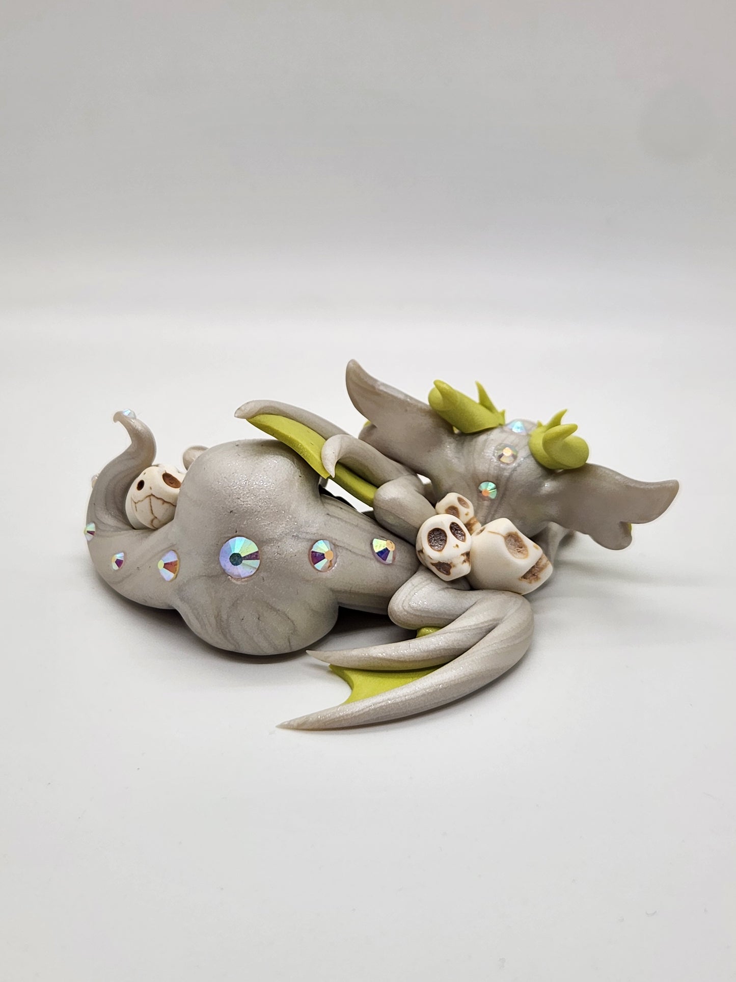 "Lehata" white and green skull dragon sculpture