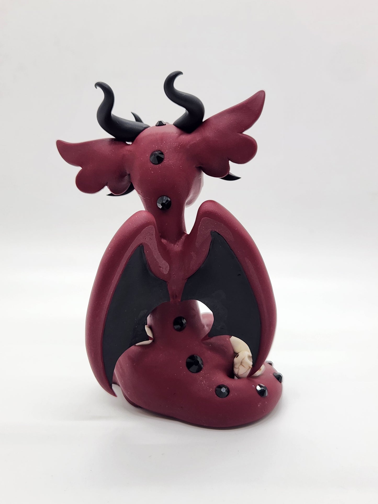 "Surnud" red and black skulls dragon sculpture