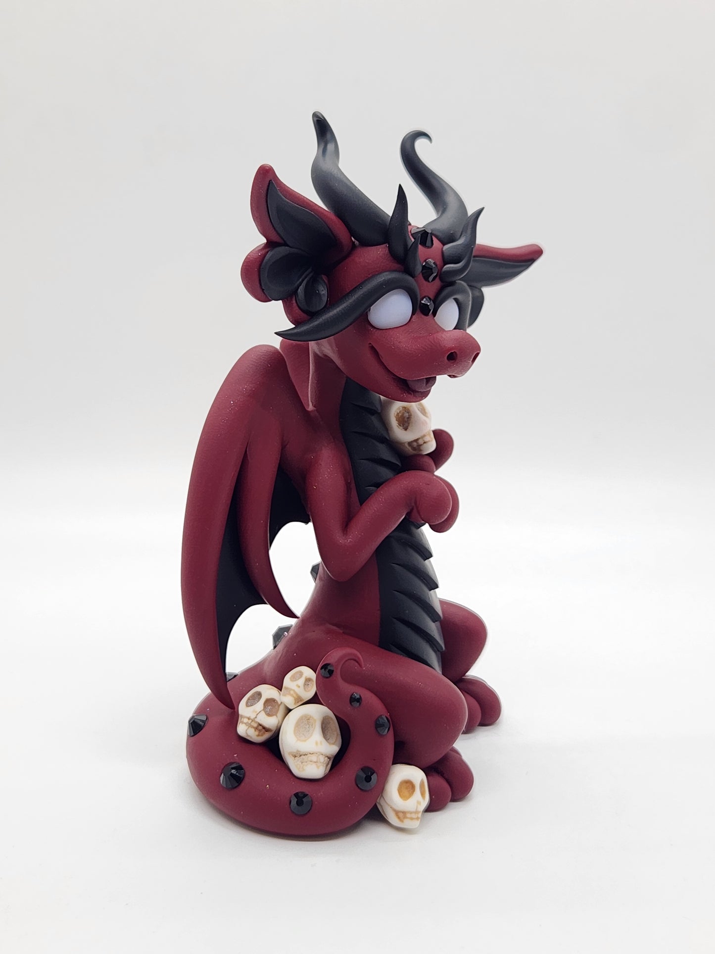 "Surnud" red and black skulls dragon sculpture