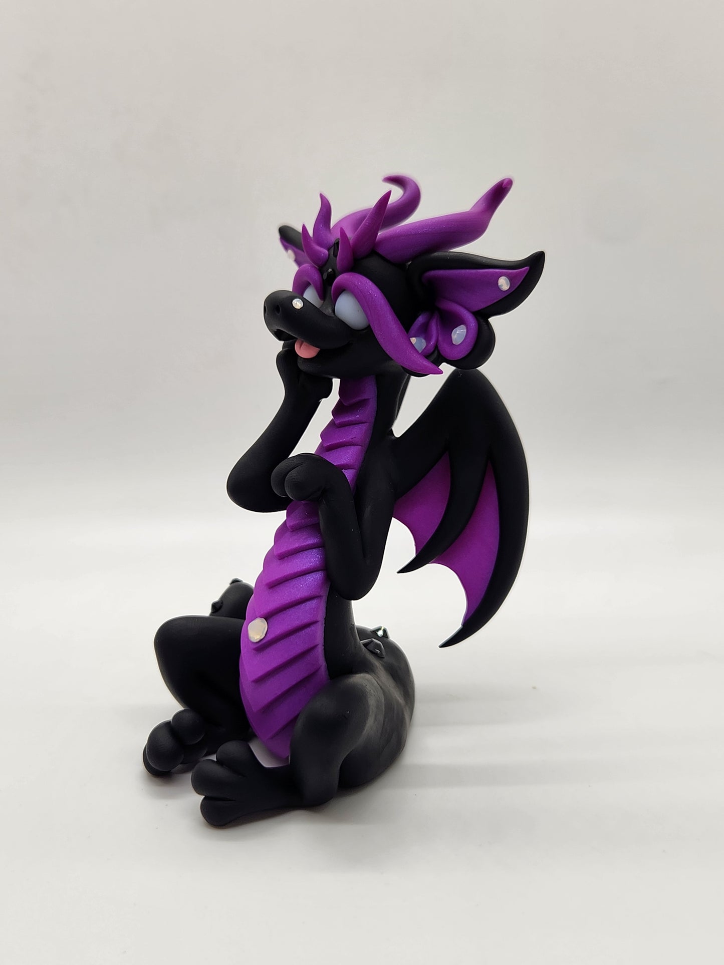 "Ubundi" black and purple dragon sculpture