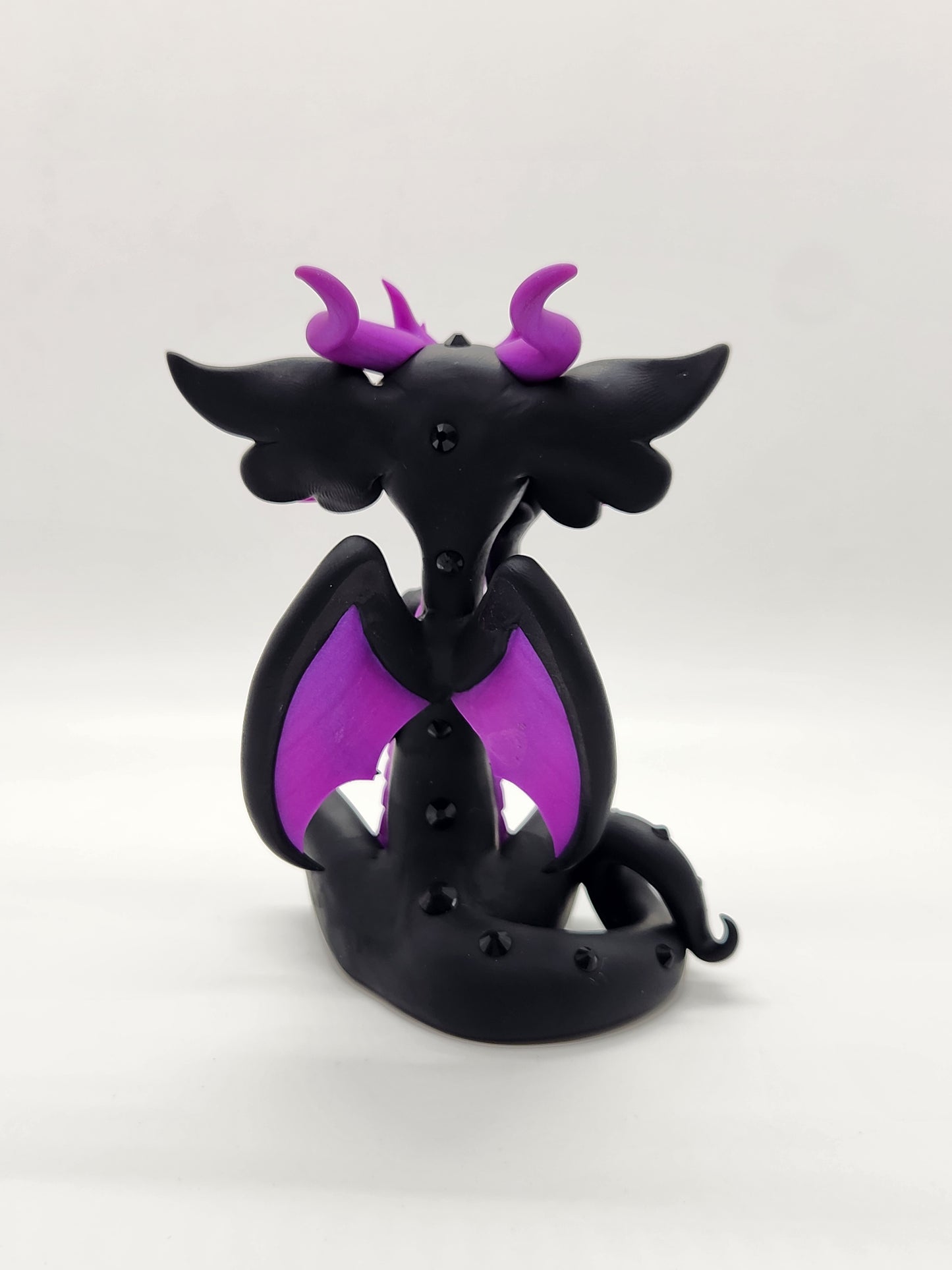 "Ubundi" black and purple dragon sculpture