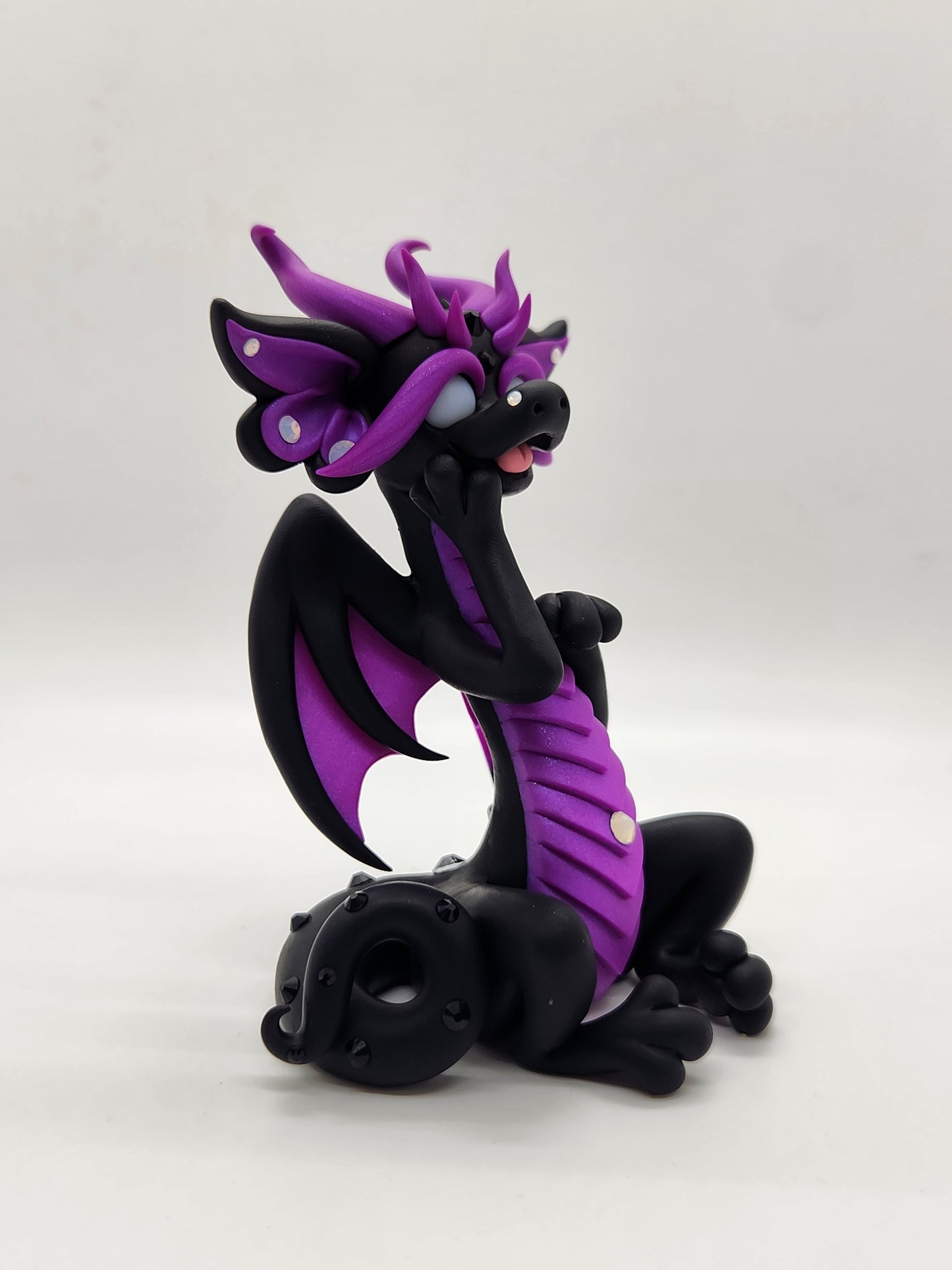 "Ubundi" black and purple dragon sculpture