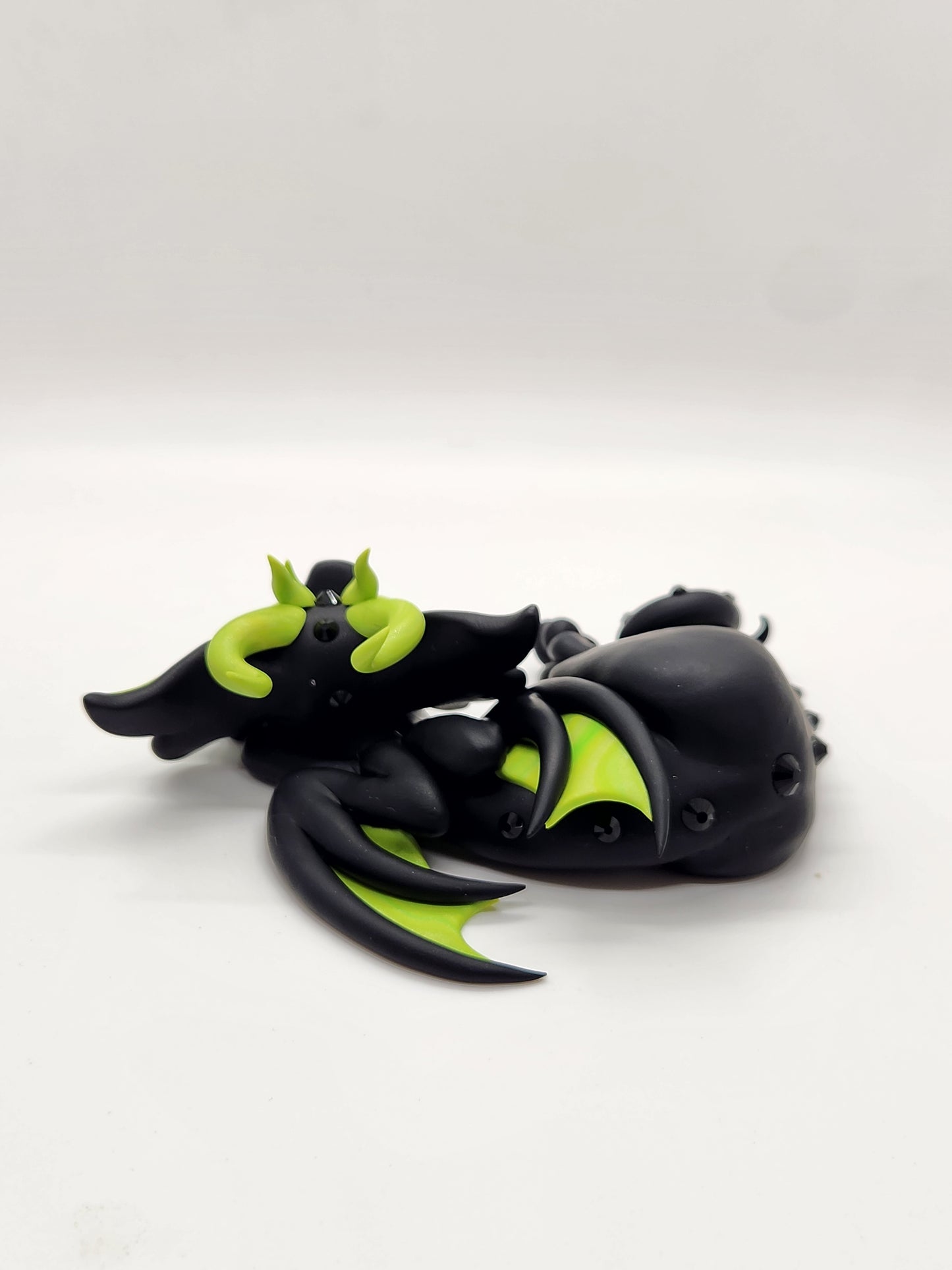 "Valkostur" black and green dragon sculpture