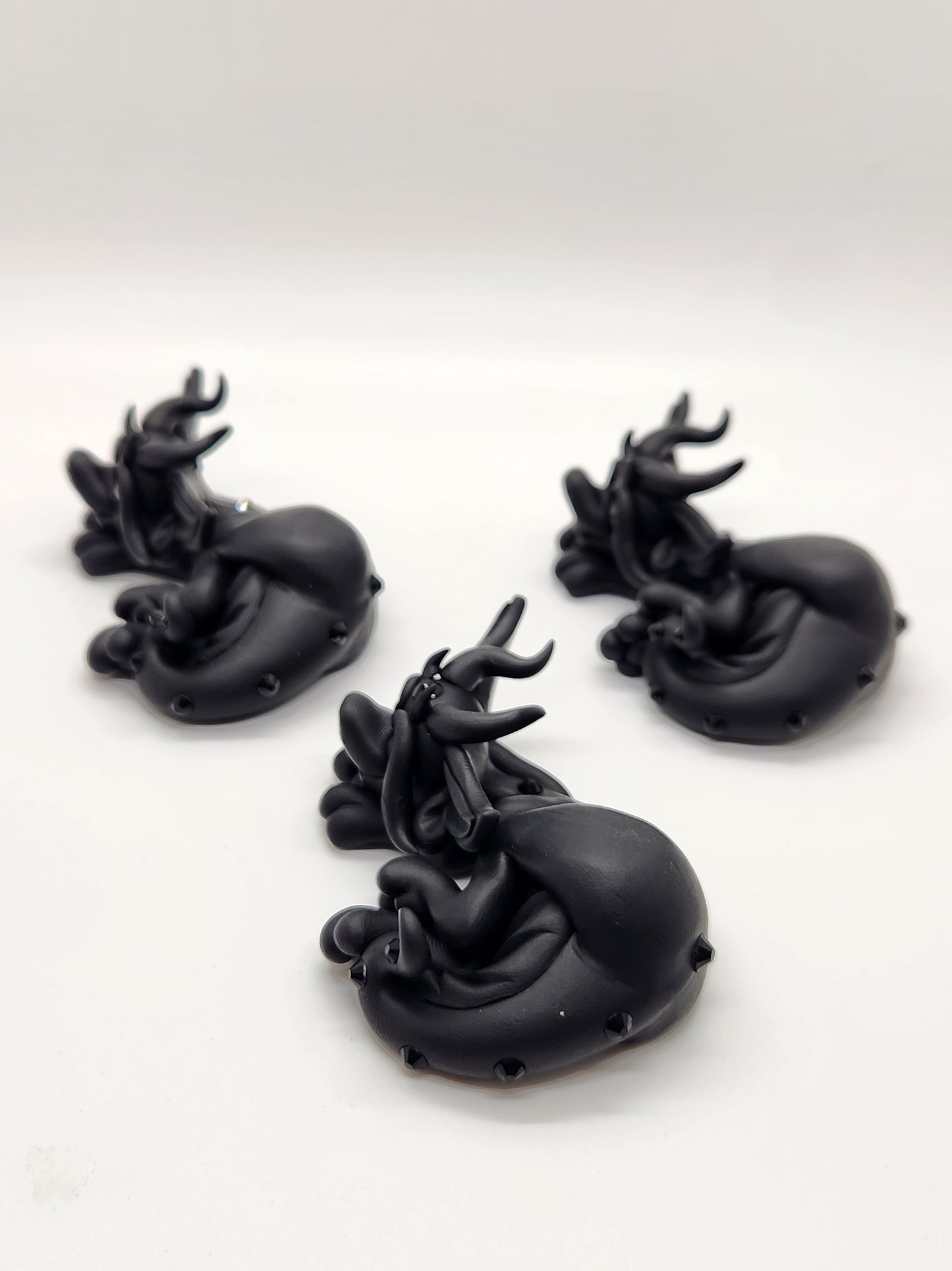 "Buio" black baby drake dragon sculptures