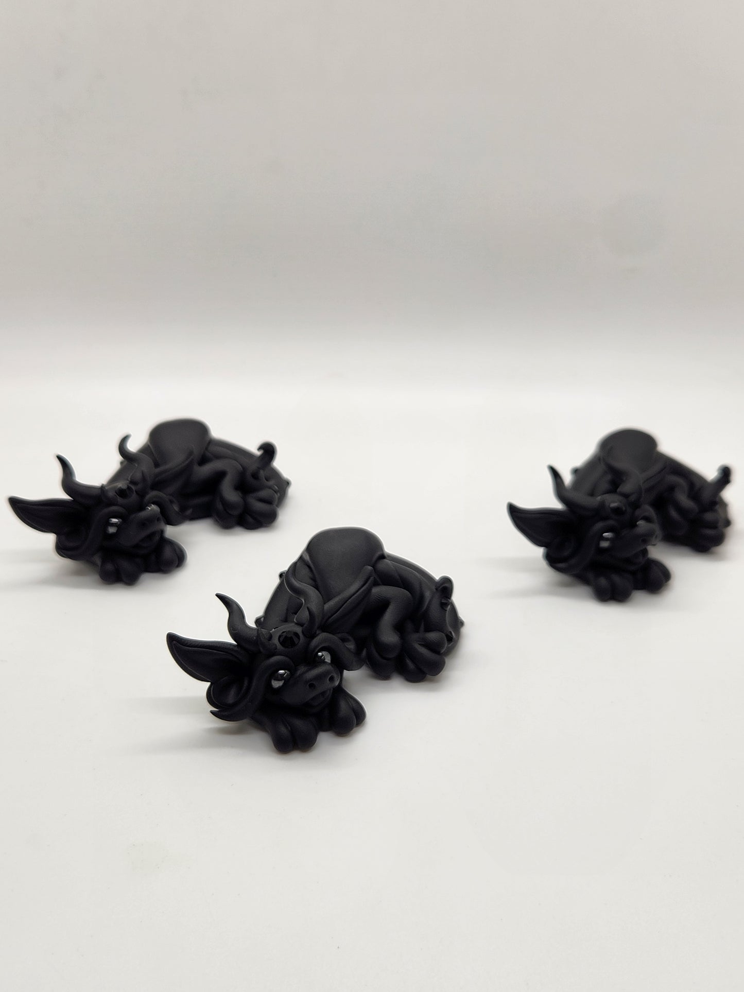 "Buio" black baby drake dragon sculptures