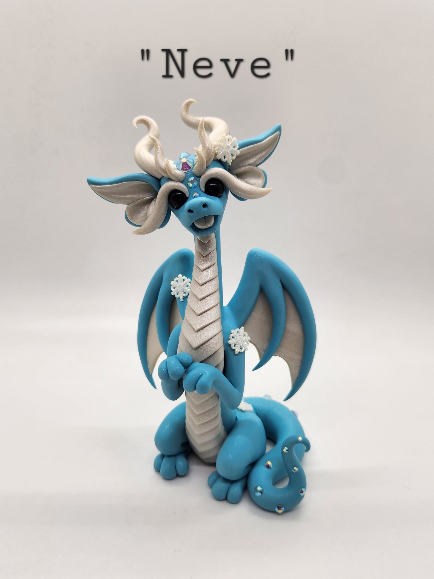 "Neve" blue snow dragon sculpture