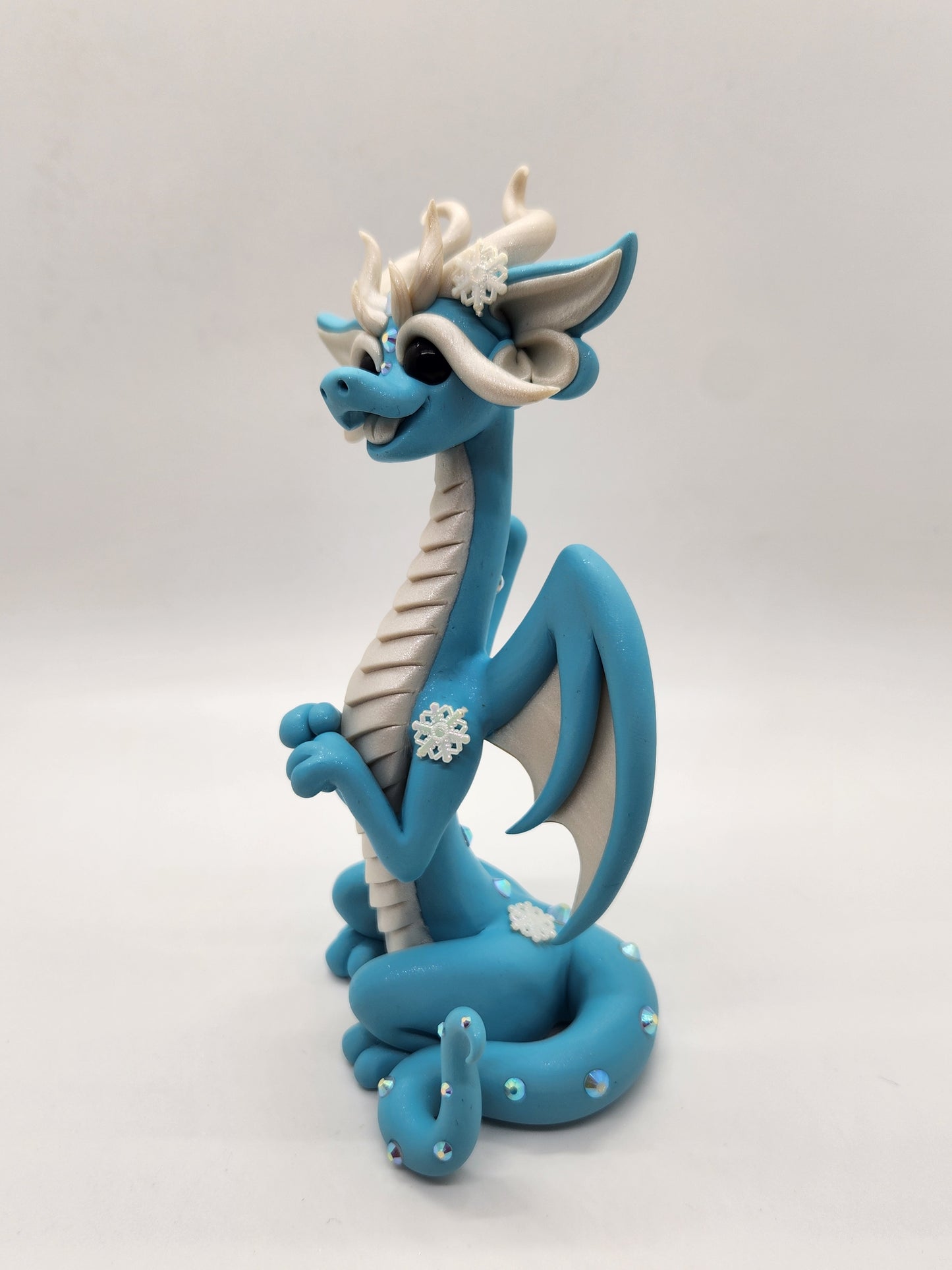 "Neve" blue snow dragon sculpture