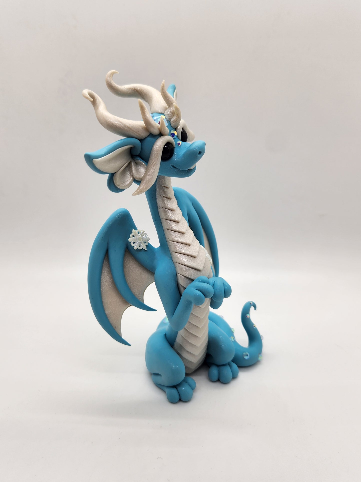 "Neve" blue snow dragon sculpture