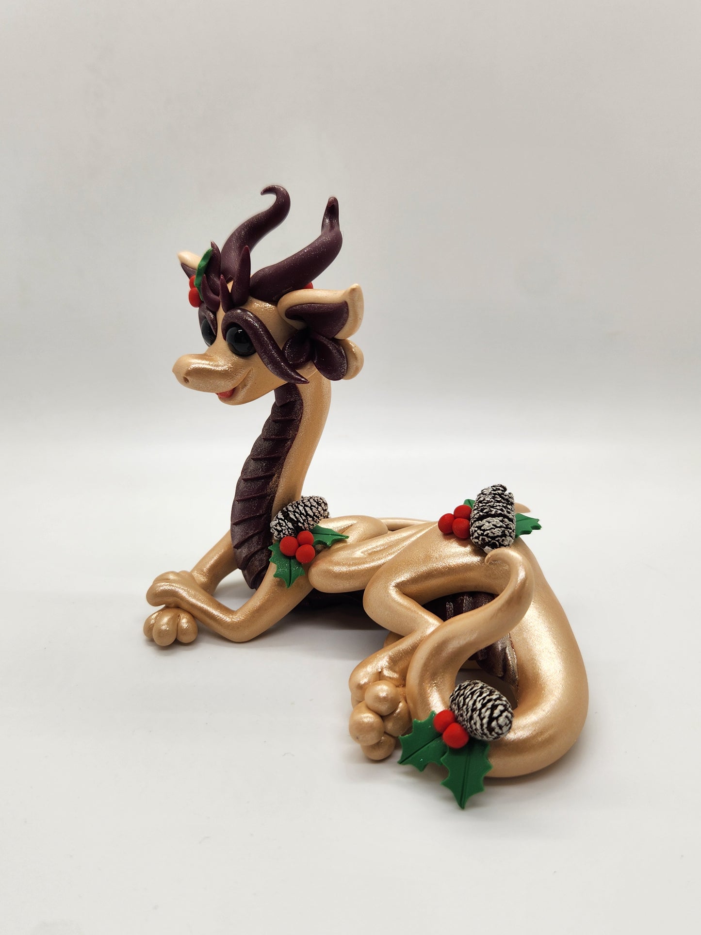 "Kulta" gold Yule dragon sculpture