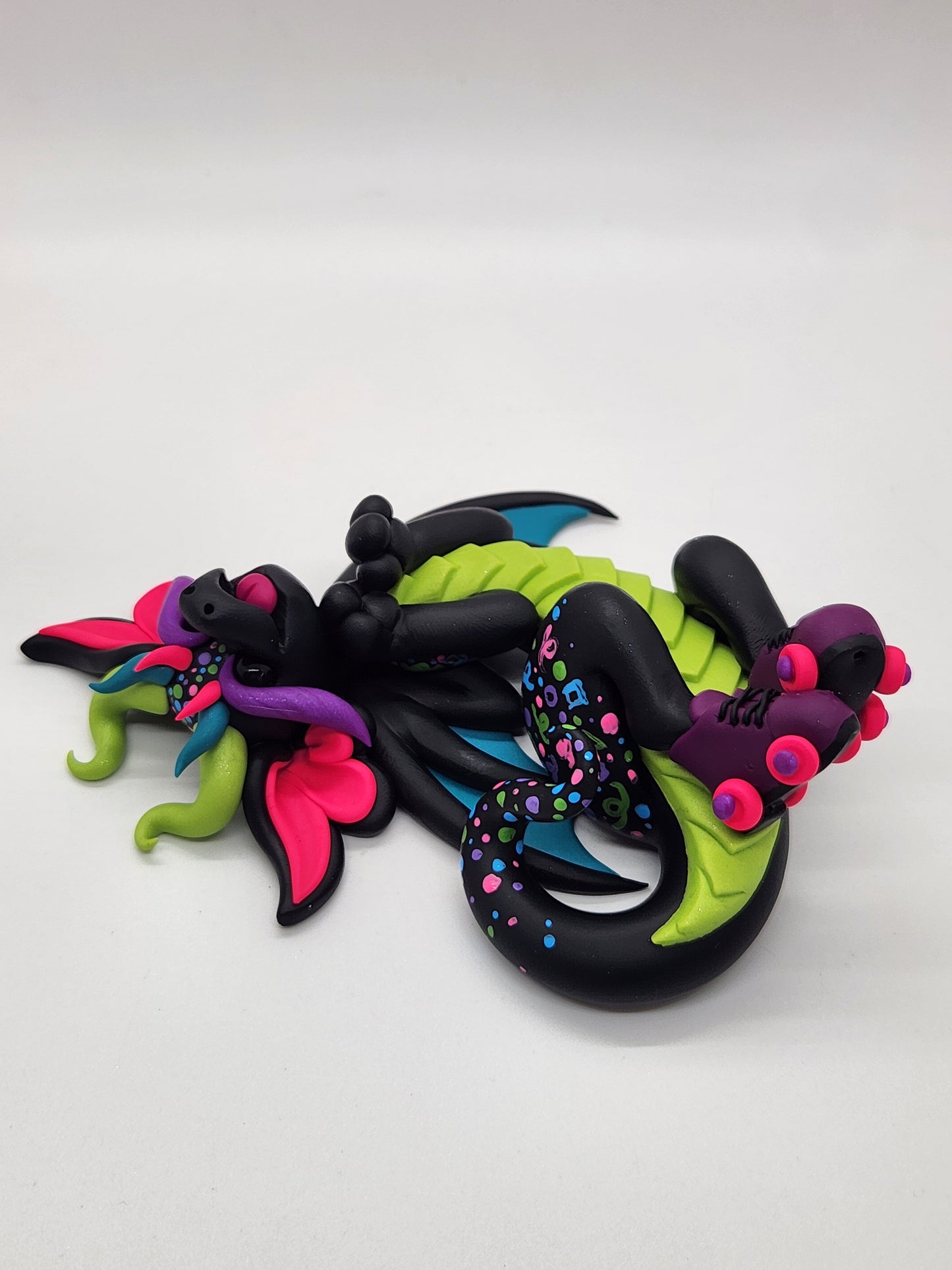 "Ryder" 90s skating rink dragon sculpture